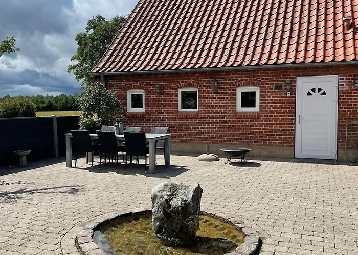 The * Langå